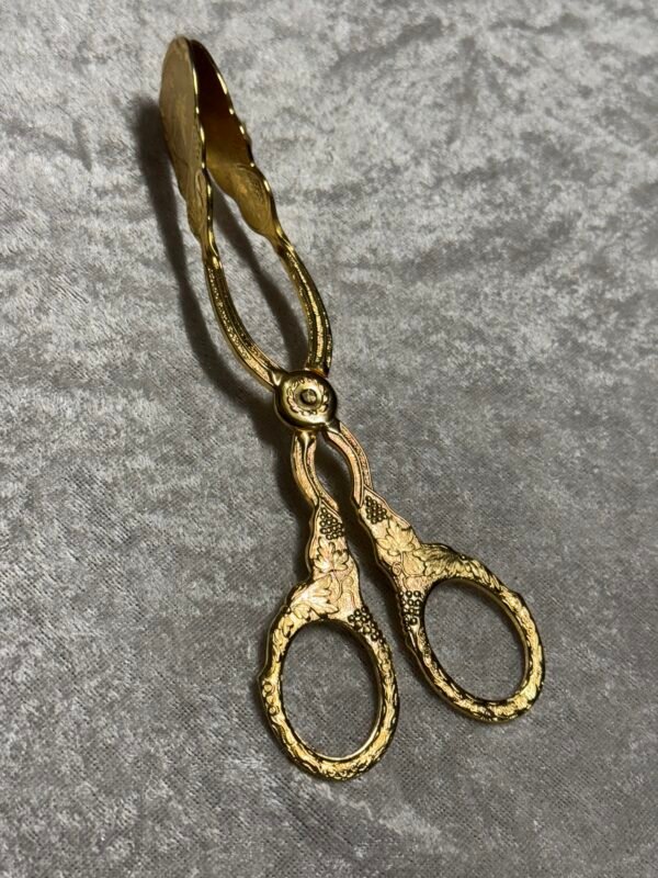 Dekoruotos metalinės konditerinės žnyplės